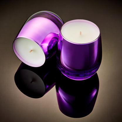 Luxury scented candle handcrafted in our shiny purple Athena stemless glass